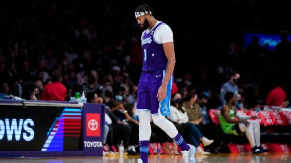 Anthony Davis walks off the court as the Lakers lost badly against the Minnesota Timberwolves on Friday evening,
